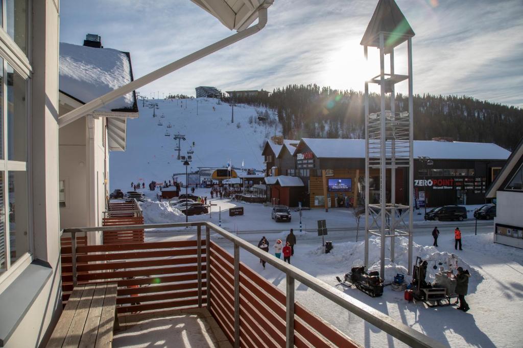 a view from a balcony of a ski resort at Ski Center Alpine Houses in Levi