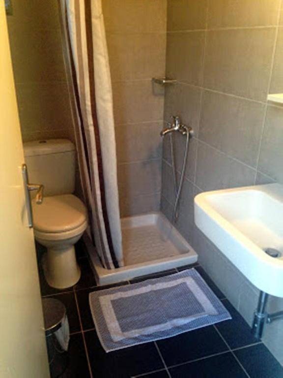 Koupelna v ubytování Sofia Rooms