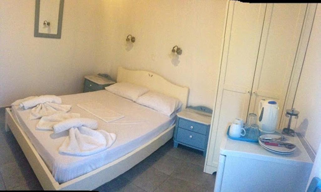 Postel nebo postele na pokoji v ubytování Sofia Rooms