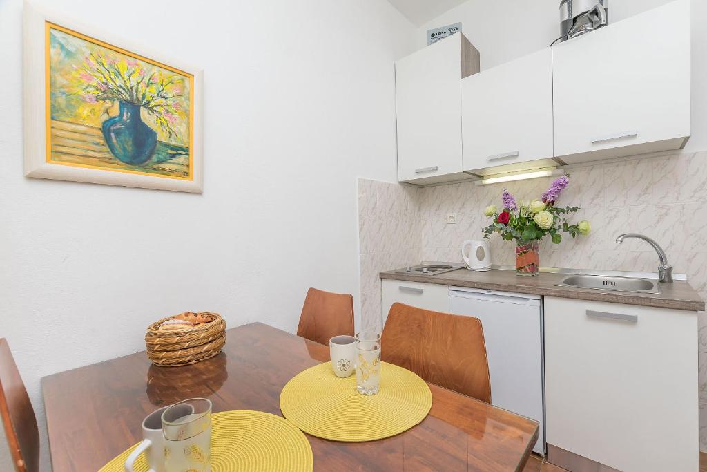 Kuchyňa alebo kuchynka v ubytovaní Apartments Clarus Mare