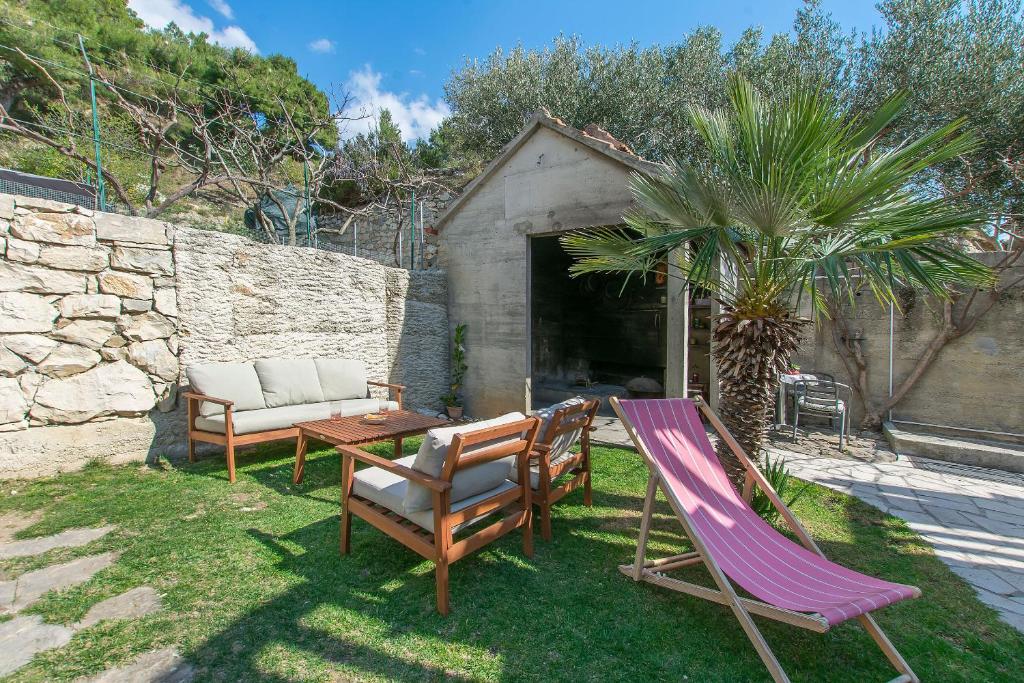 Vonkajšia záhrada v ubytovaní Apartments Clarus Mare
