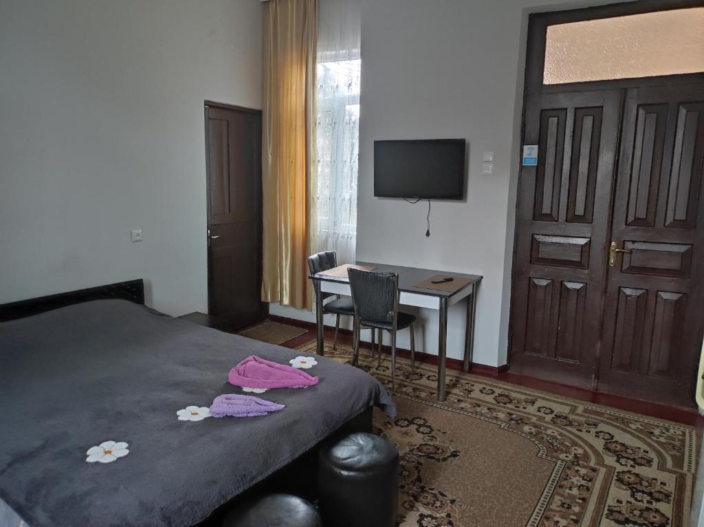 Postel nebo postele na pokoji v ubytování Guest House Koba