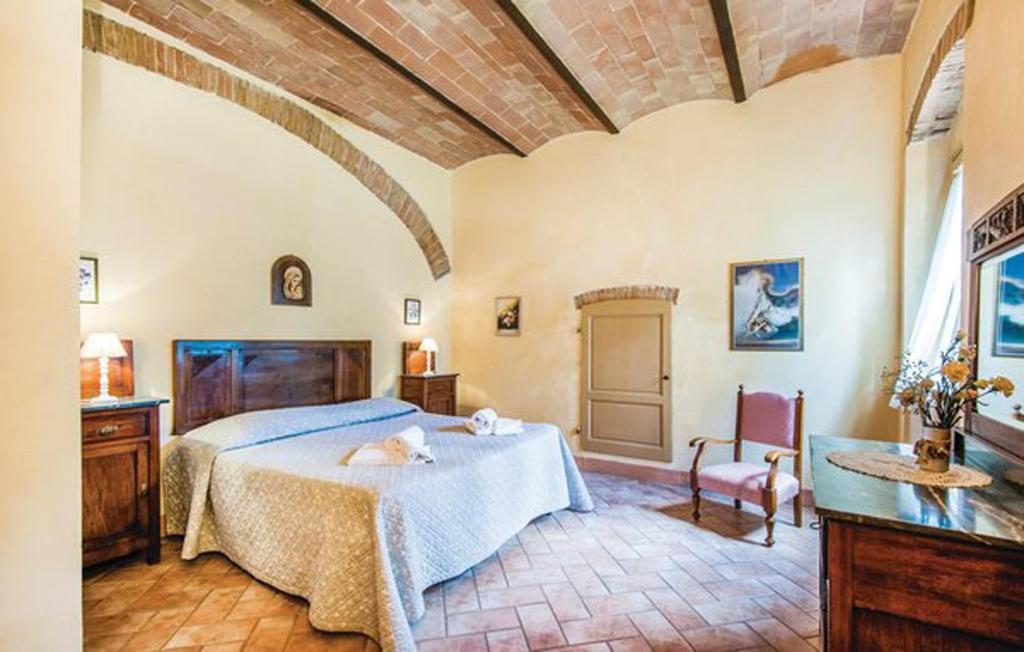 Posteľ alebo postele v izbe v ubytovaní Agriturismo Fattoria Il Piano - Appartamento Stalla - San Gimignano