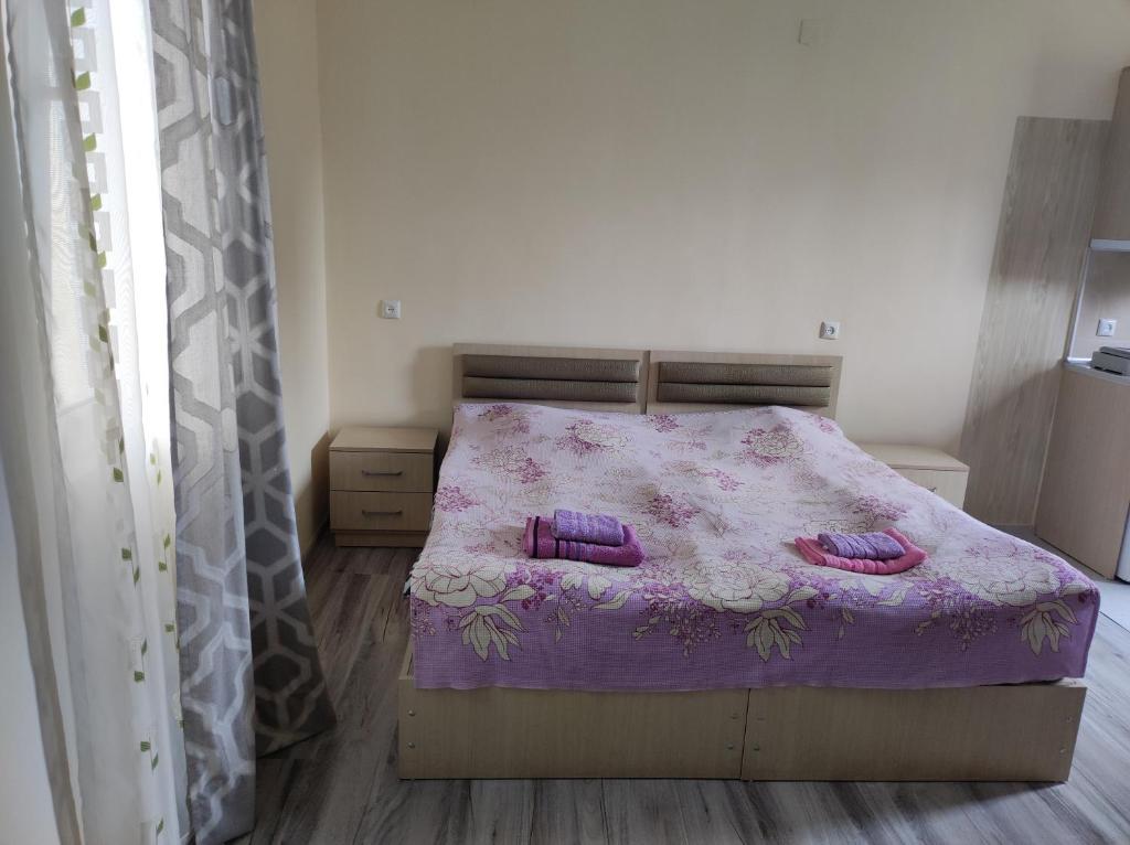 Postel nebo postele na pokoji v ubytování Guest House Koba