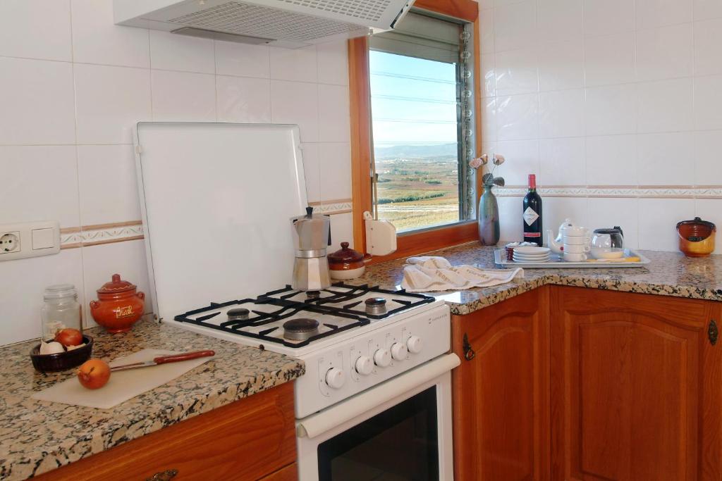 Kuchyň nebo kuchyňský kout v ubytování Agroturisme Cal Jeroni