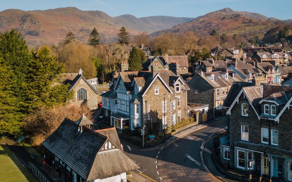 an aerial view of a town with mountains in the background at The Gables Guest House in Ambleside