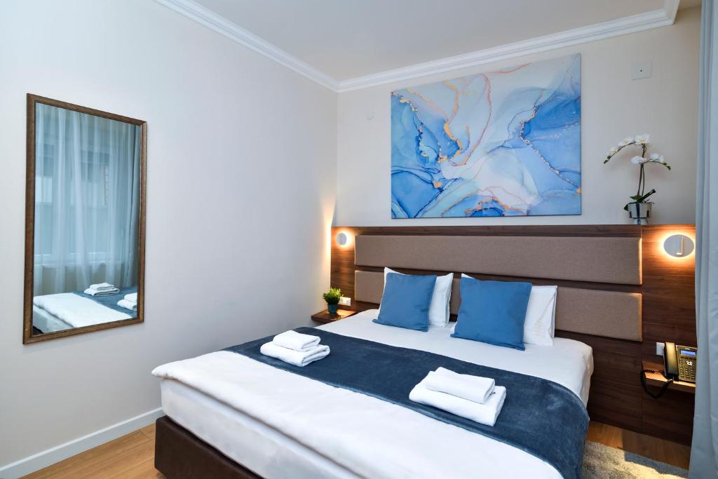 Krevet ili kreveti u jedinici u okviru objekta Hotel Opera Garni