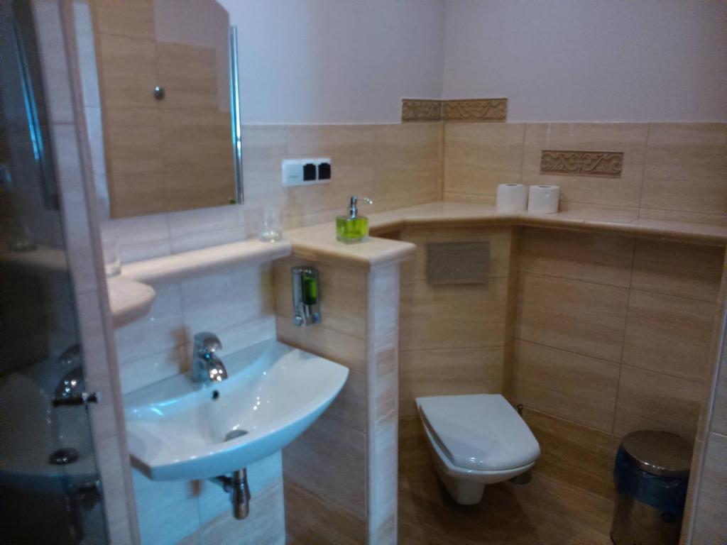 Kúpeľňa v ubytovaní Centrum Konferencyjne IBIB PAN