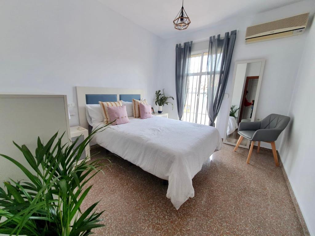 Posteľ alebo postele v izbe v ubytovaní Apartamento Centro Peña de los Enamorados
