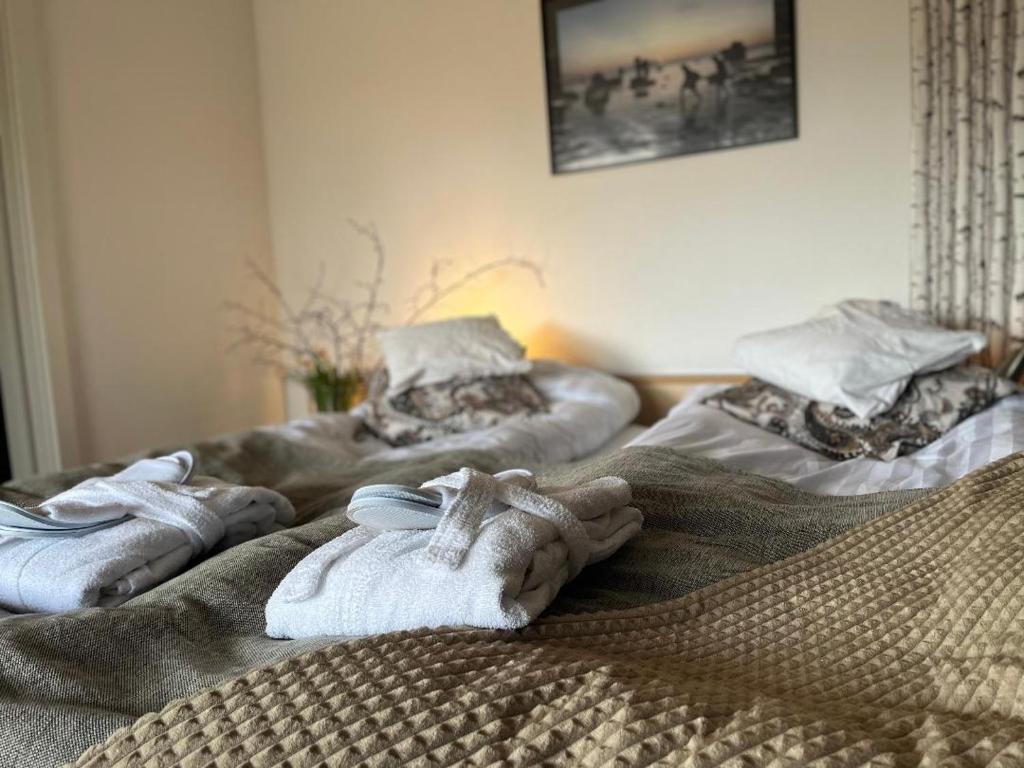 Postel nebo postele na pokoji v ubytování Fröjel Resort & Spa