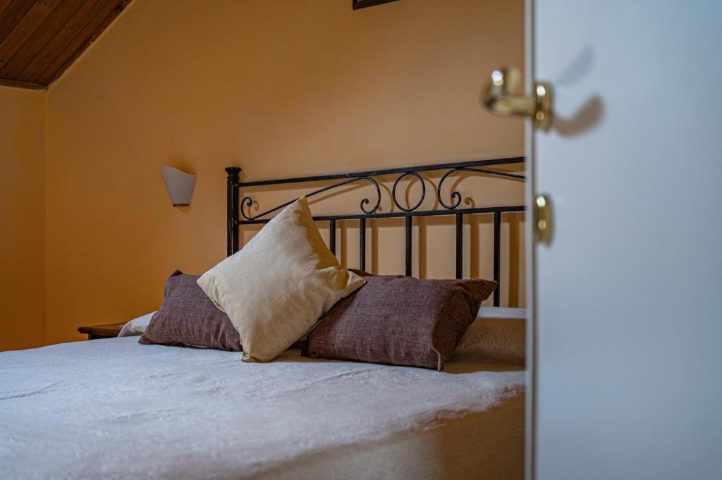Ένα ή περισσότερα κρεβάτια σε δωμάτιο στο Bed and Breakfast Donna Olimpia