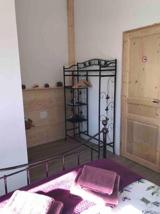 Postel nebo postele na pokoji v ubytování Ferme de Noyes