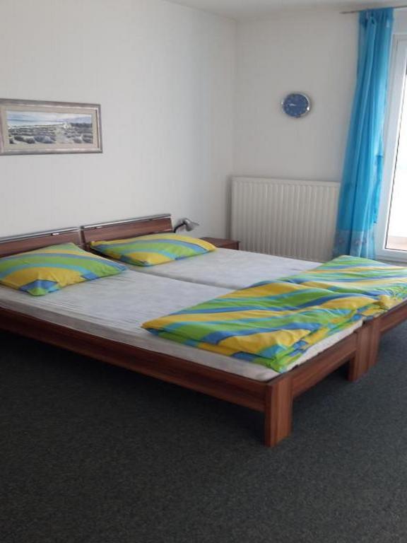 Postel nebo postele na pokoji v ubytování Apartments Da - Dent
