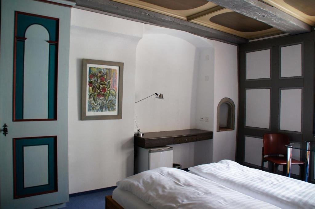 Postel nebo postele na pokoji v ubytování Hotel Vadian Garni