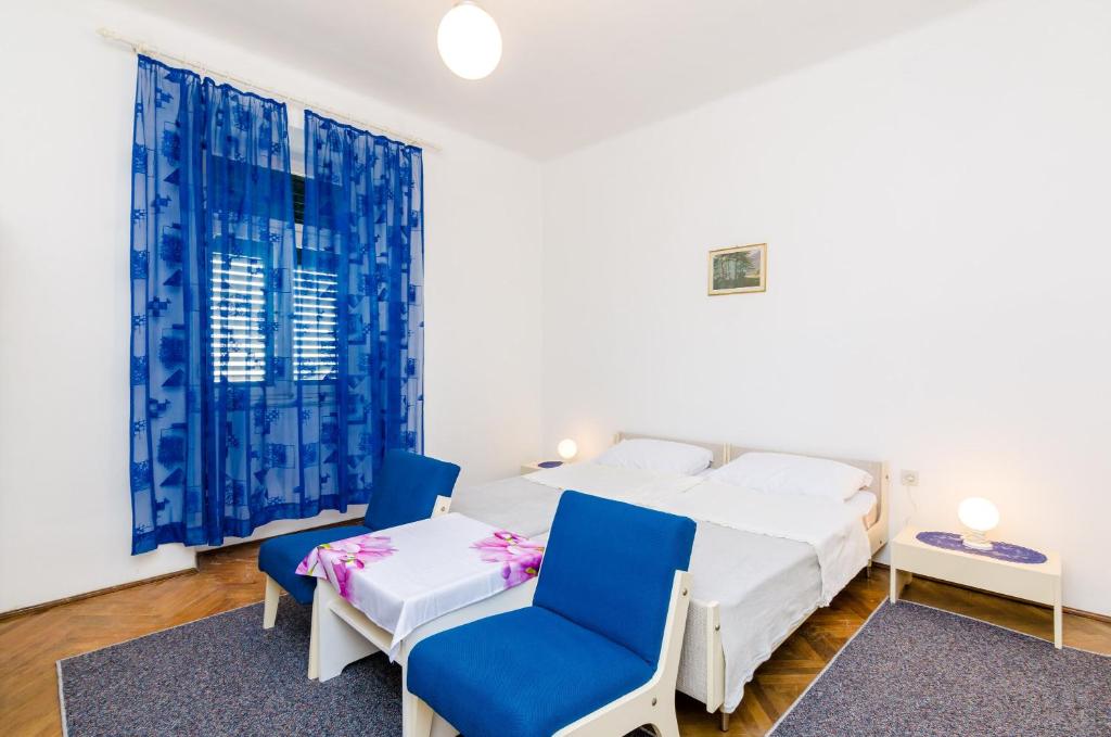 Postel nebo postele na pokoji v ubytování Apartment Lucy