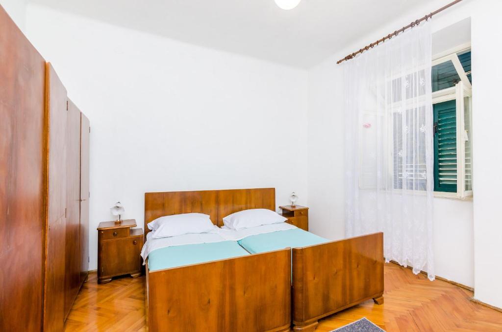 Postel nebo postele na pokoji v ubytování Apartment Lucy