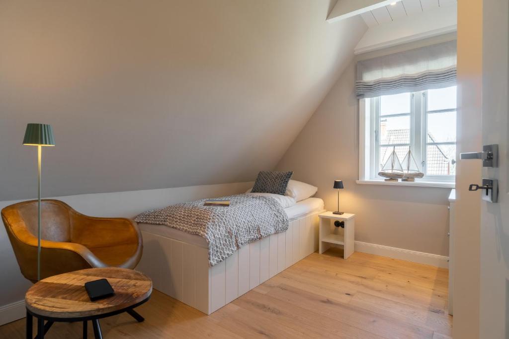 Postel nebo postele na pokoji v ubytování Haus Hilde