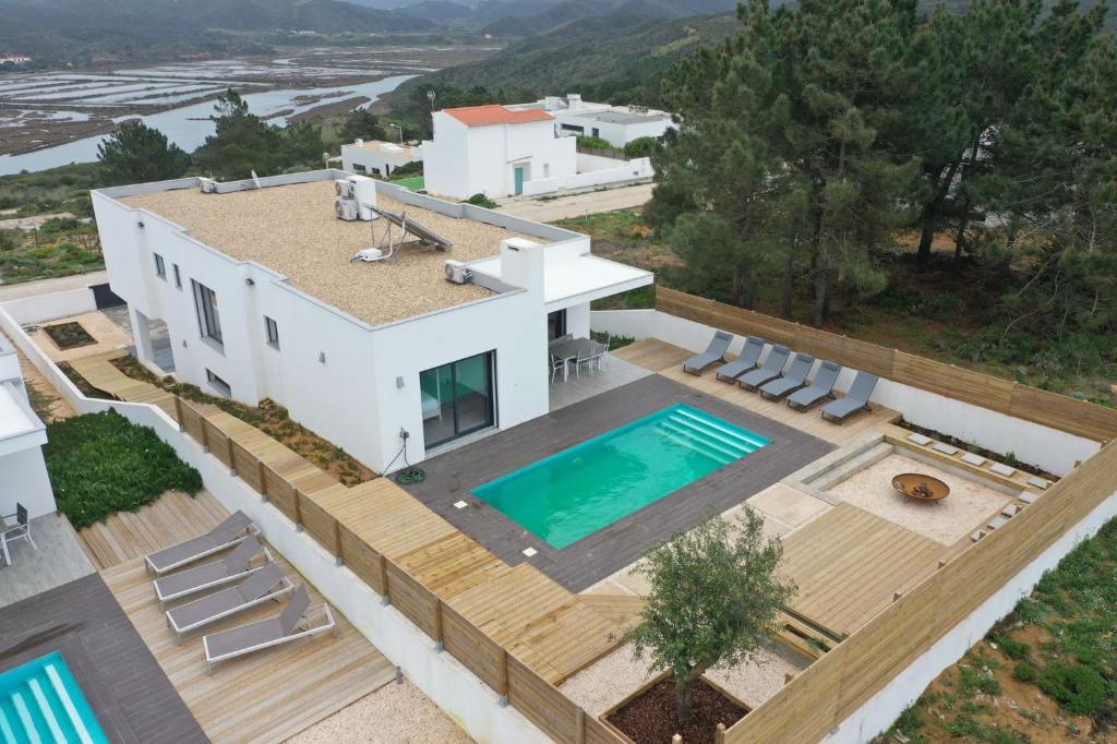 an aerial view of a house with a swimming pool at Cairnvillas Villa Flow C40 Luxury Villa with Private Swimming Pool near Beach in Aljezur