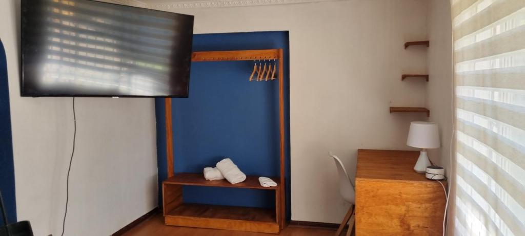 TV a/nebo společenská místnost v ubytování MAKTVB Costanera - Hostal Boutique