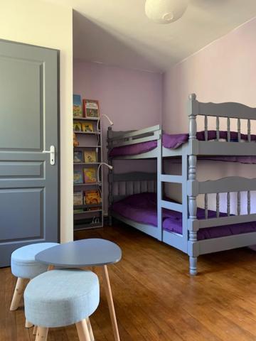Postel nebo postele na pokoji v ubytování Maison d'Hôtes "La Pierre Pointue"