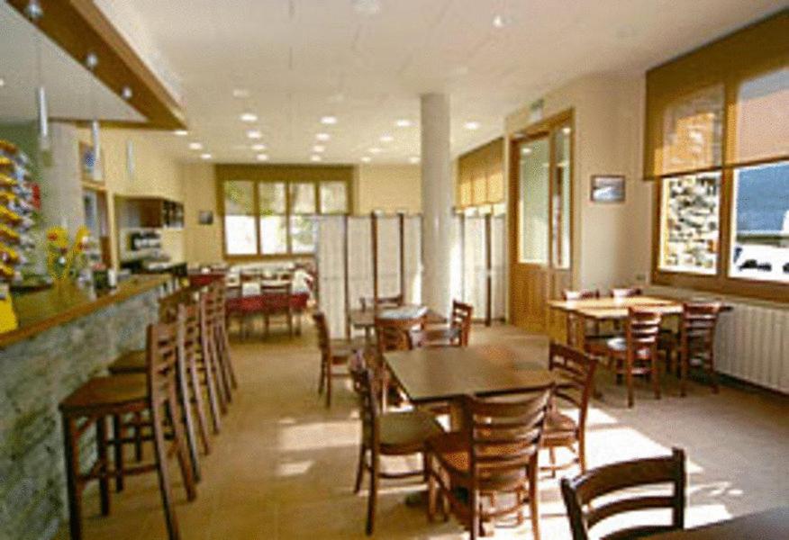 Posezení v ubytování Hostal Les Roquetes