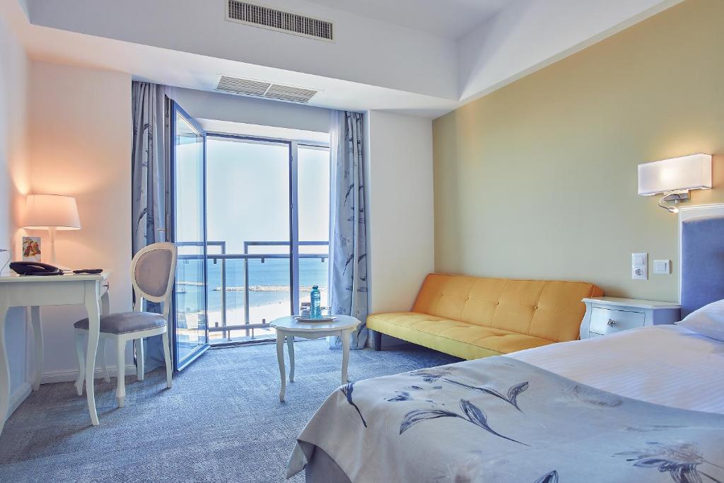 Кровать или кровати в номере Continental Forum Constanta