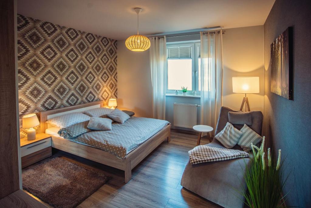 Postel nebo postele na pokoji v ubytování Apartament VIEW Wisla
