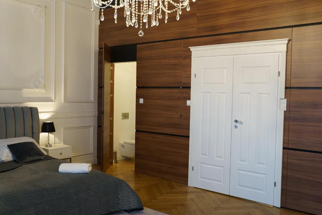 Posteľ alebo postele v izbe v ubytovaní Prestige Apartment Rynek Kielce