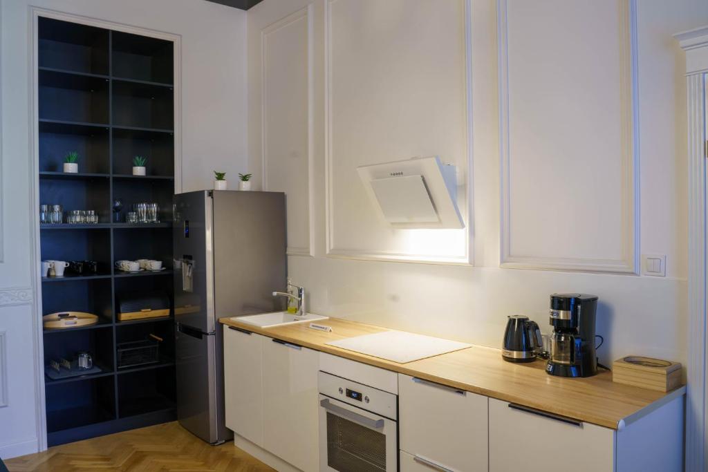 Kuchyňa alebo kuchynka v ubytovaní Prestige Apartment Rynek Kielce