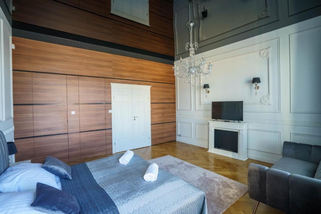 Televízia a/alebo spoločenská miestnosť v ubytovaní Prestige Apartment Rynek Kielce
