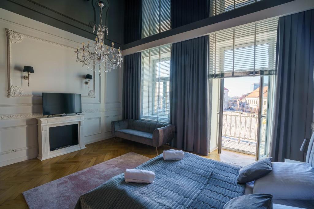 Televízia a/alebo spoločenská miestnosť v ubytovaní Prestige Apartment Rynek Kielce