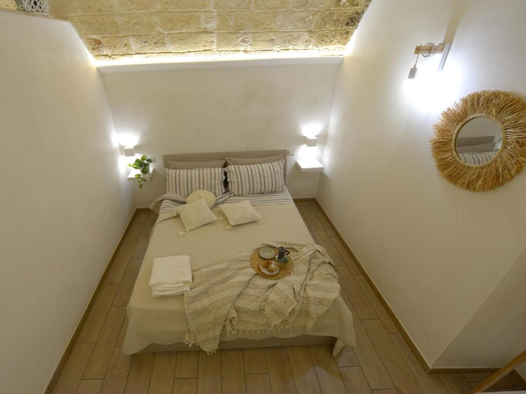 Posteľ alebo postele v izbe v ubytovaní Castrum Casa Vacanza
