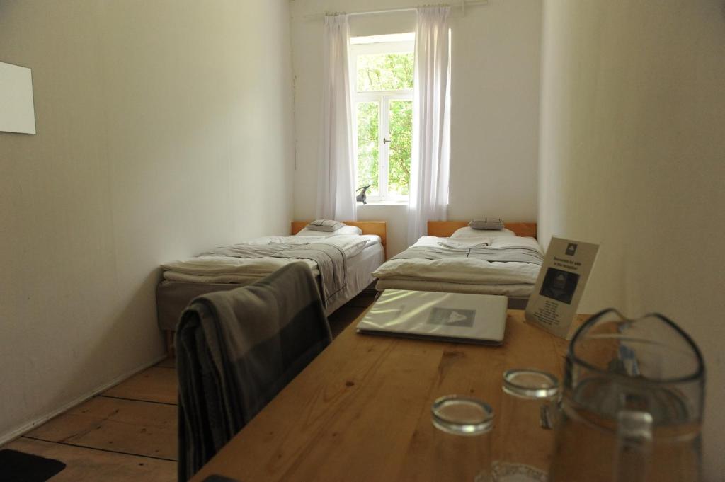 Postel nebo postele na pokoji v ubytování Grand Hotel Ushba