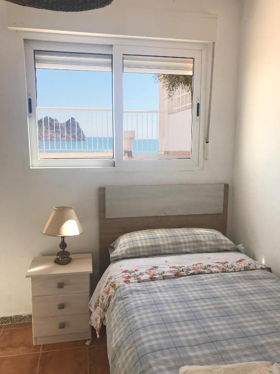 Postel nebo postele na pokoji v ubytování La Paloma, Chalet a pie de playa