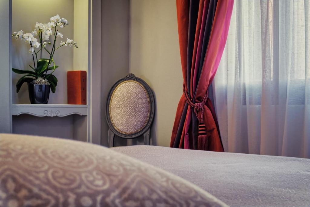 Postel nebo postele na pokoji v ubytování Locanda Fiorita