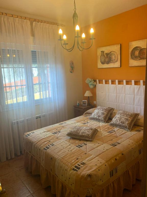 En eller flere senge i et værelse på LOS PRUNOS