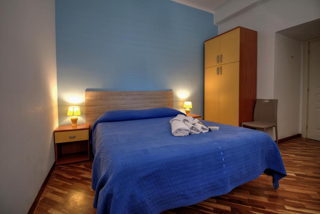 A bed or beds in a room at Ai Bastioni del Massimo