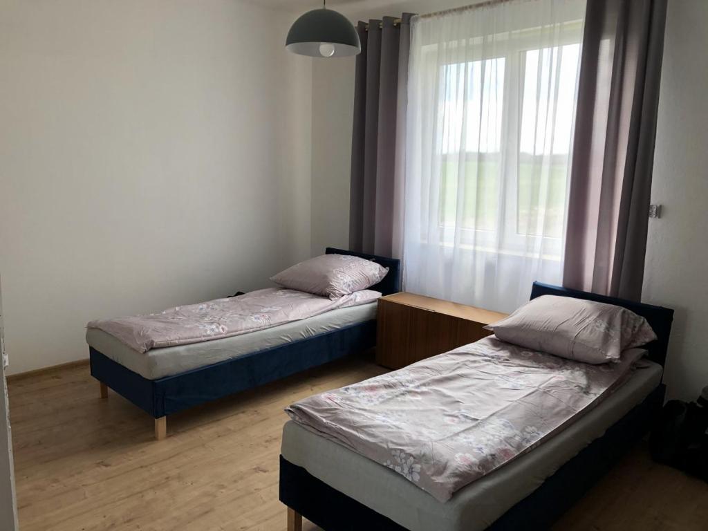 Posteľ alebo postele v izbe v ubytovaní Agroturystyka „Nadbużański Świt”
