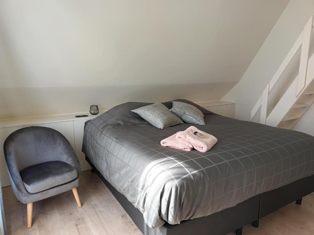 Postel nebo postele na pokoji v ubytování B&B Snelleghem