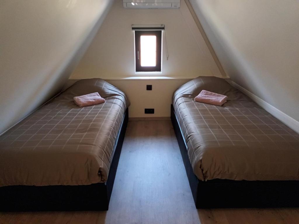 Postel nebo postele na pokoji v ubytování B&B Snelleghem