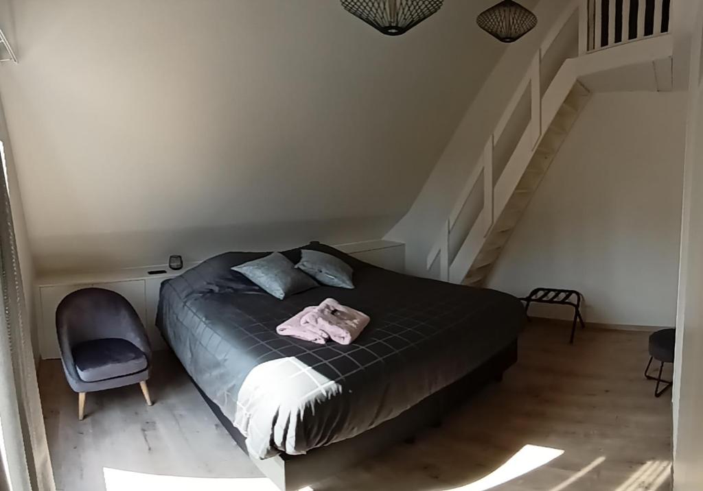 Postel nebo postele na pokoji v ubytování B&B Snelleghem