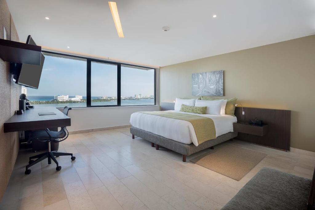 Postel nebo postele na pokoji v ubytování Presidente InterContinental Cancun Resort