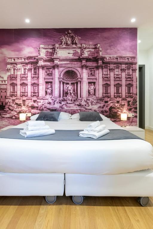 Łóżko lub łóżka w pokoju w obiekcie Trevi Elite Rome