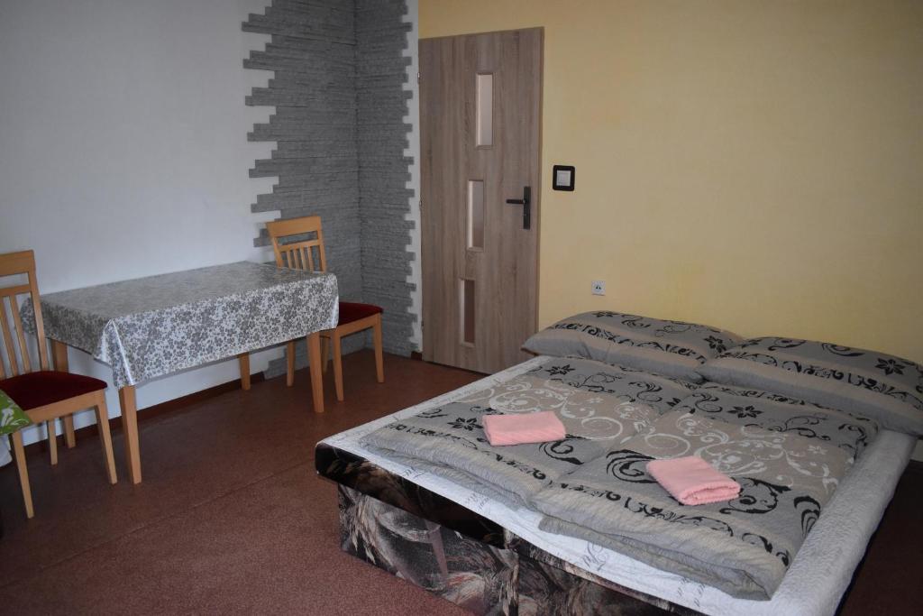 Postel nebo postele na pokoji v ubytování Penzion Janka