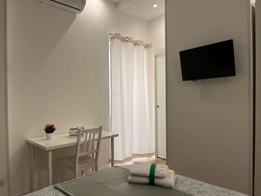 TV a/nebo společenská místnost v ubytování Aura b&b