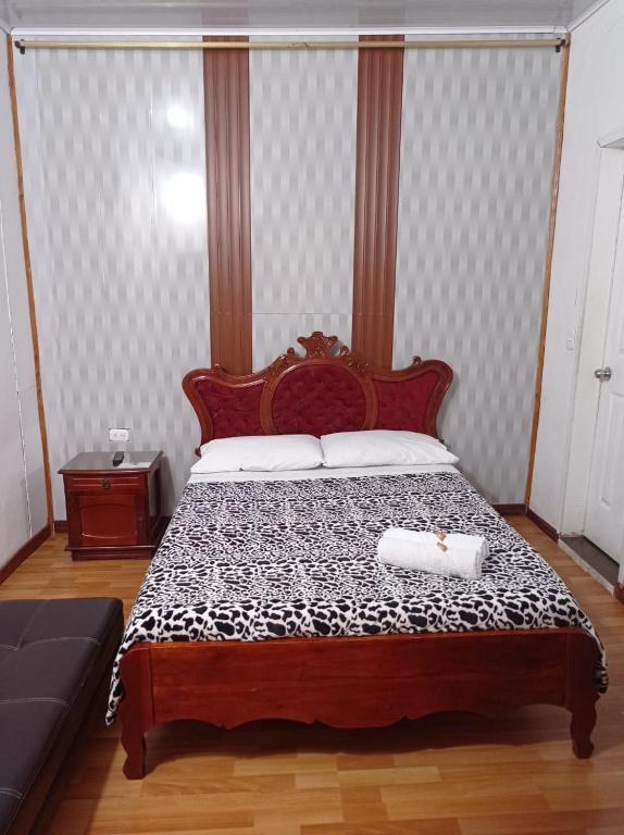 Cama o camas de una habitación en Bonsai Hotel Salamina Caldas