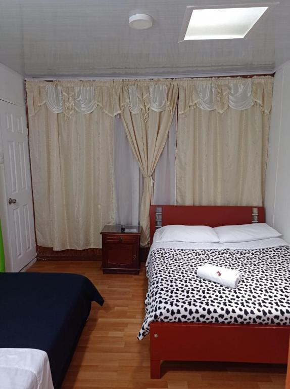 Cama o camas de una habitación en Bonsai Hotel Salamina Caldas