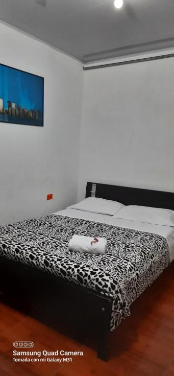 Cama o camas de una habitación en Bonsai Hotel Salamina Caldas