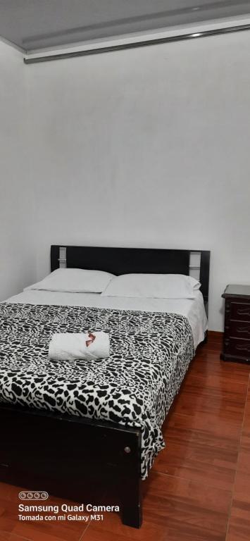 Cama o camas de una habitación en Bonsai Hotel Salamina Caldas