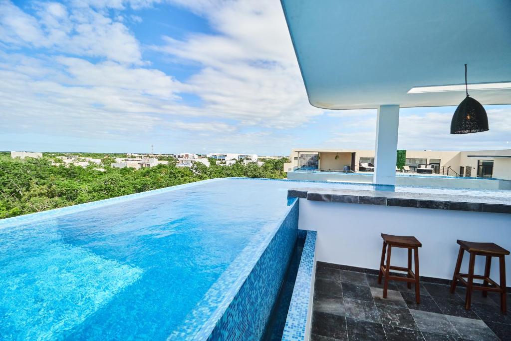 Mynd úr myndasafni af Modern Studio with Rooftop pool + 500MB Internet FAST SPEED í Tulum